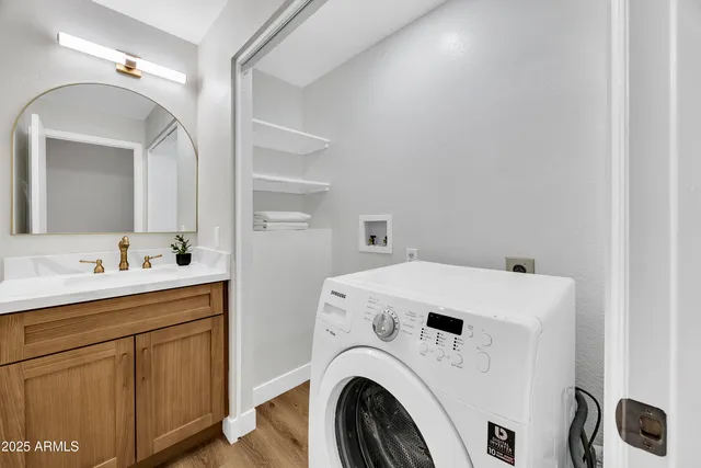 a utility room with dryer and washer