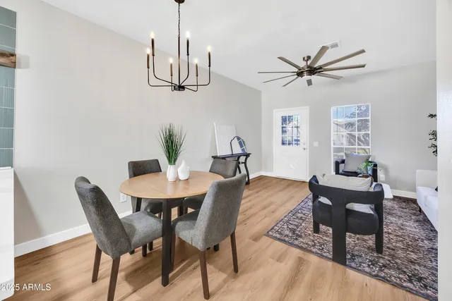 a view of a dining room with furniture