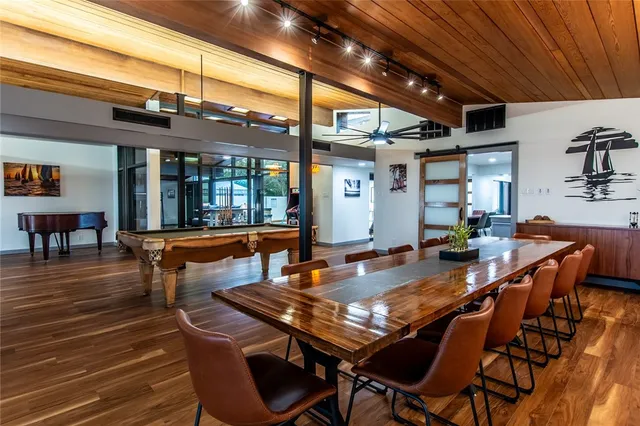 a dining room with wooden floor