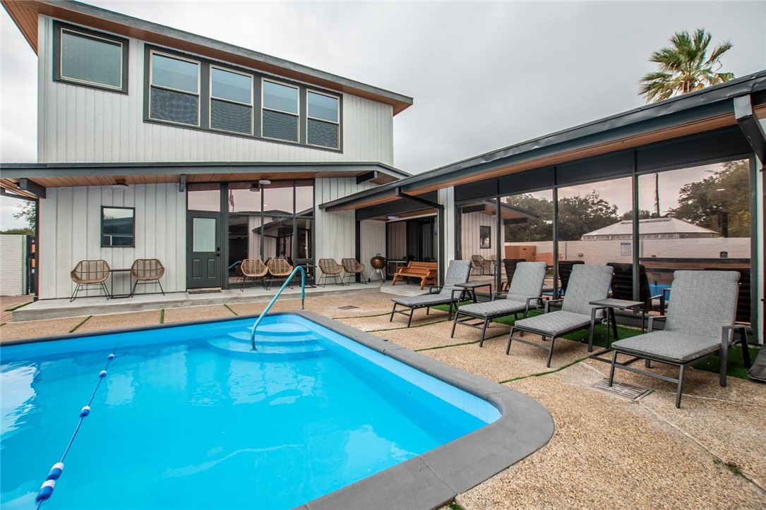 1617 Ocean Drive Corpus Christi, TX 78404 - Photo 27 of 40 a view of a swimming pool with outdoor seating