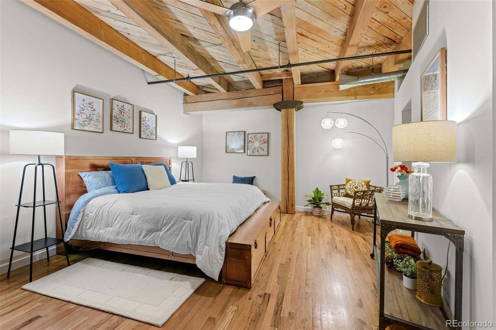 1745 Wazee Street, Unit 3C Denver, CO 80202 - Photo 20 of 23 a bed room with a bed and a table