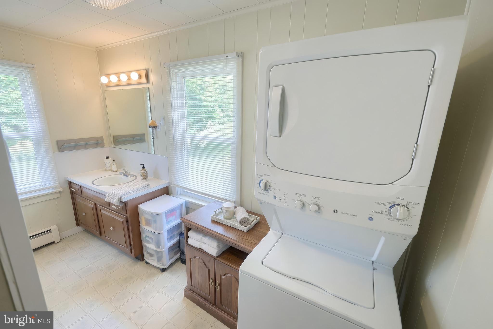 6016 Baltimore Pike Littlestown, PA 17340 - Photo 14 of 32 a bathroom with a tub sink and mirror