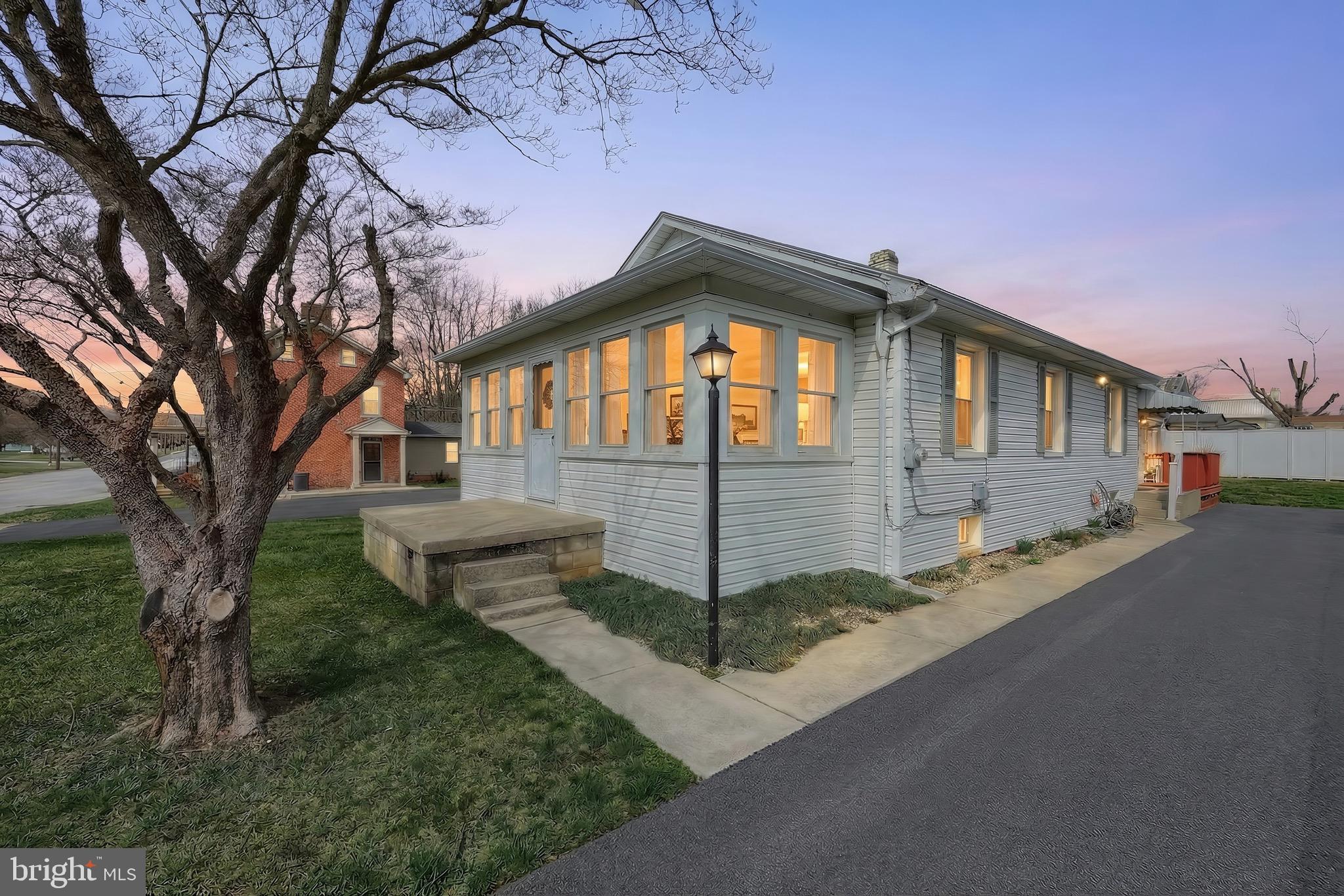 6016 Baltimore Pike Littlestown, PA 17340 - Photo 27 of 32 a front view of a house with a yard