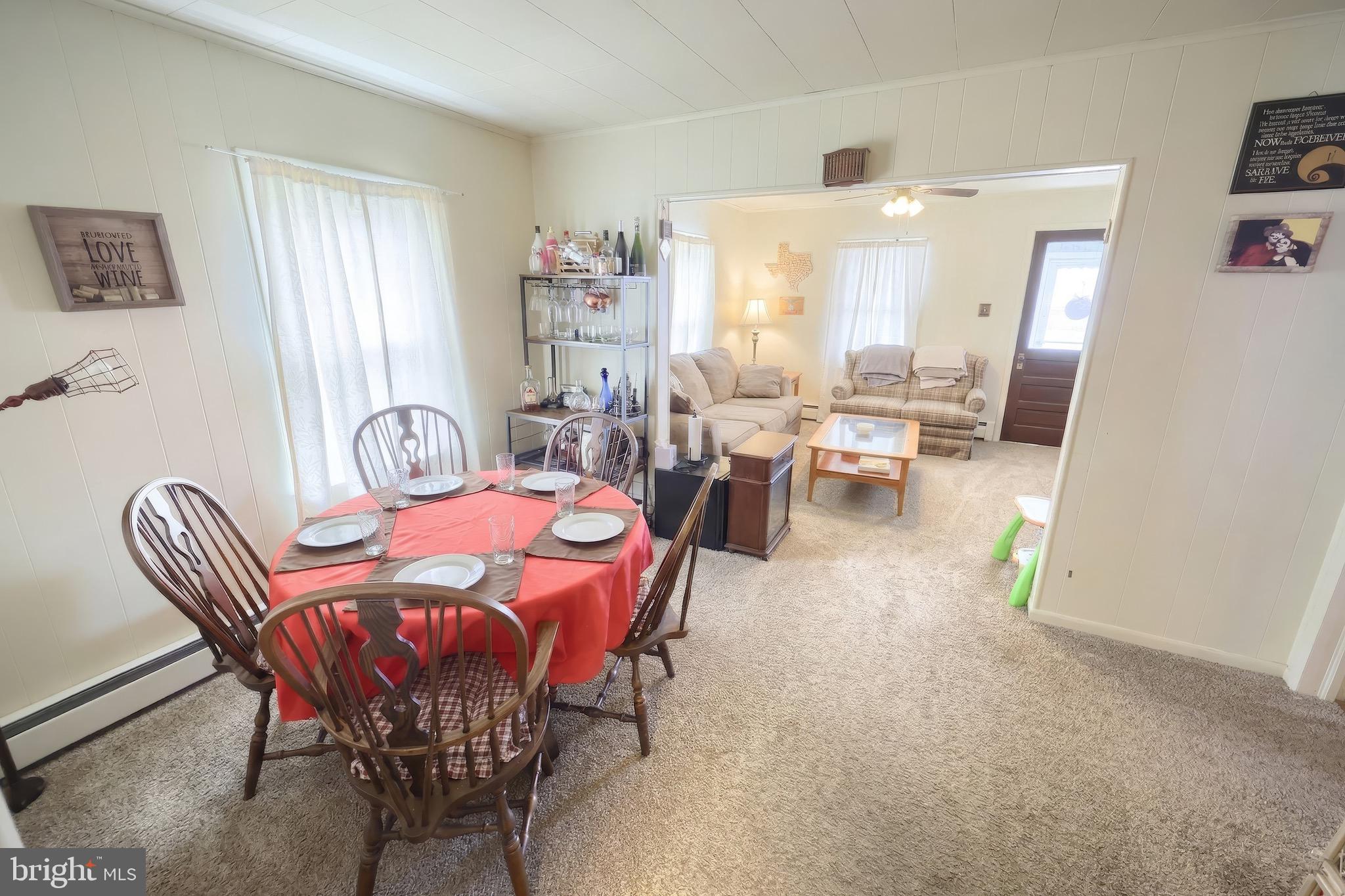 6016 Baltimore Pike Littlestown, PA 17340 - Photo 5 of 32 a view of a dining room with furniture