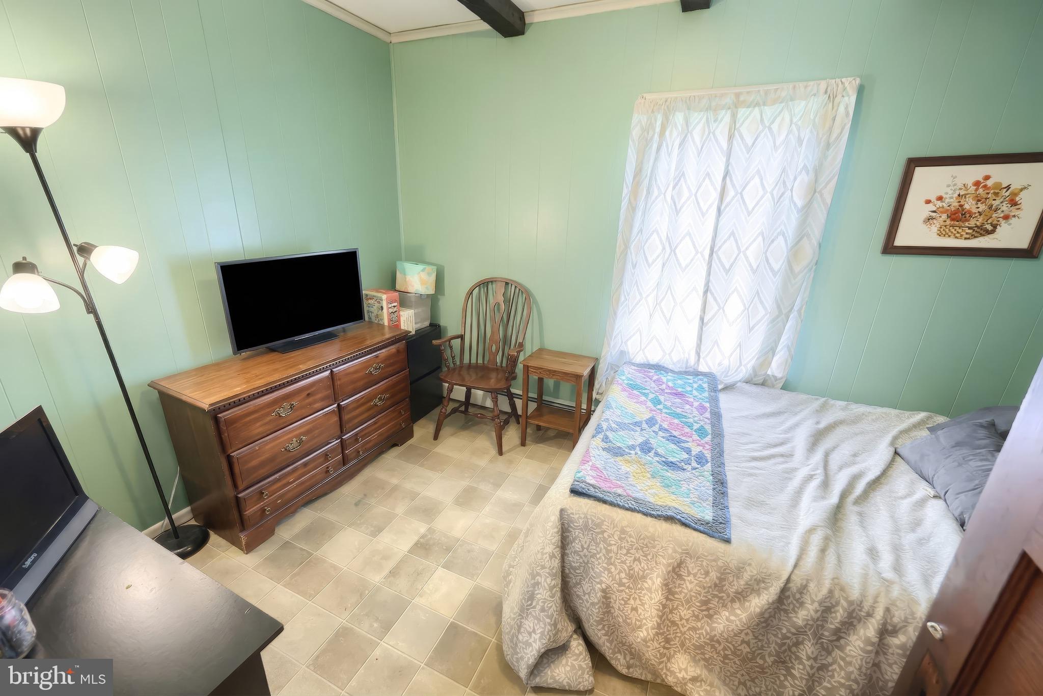 6016 Baltimore Pike Littlestown, PA 17340 - Photo 10 of 32 a bedroom with a bed and furniture