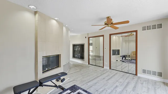a view of a livingroom with couch and cabinet