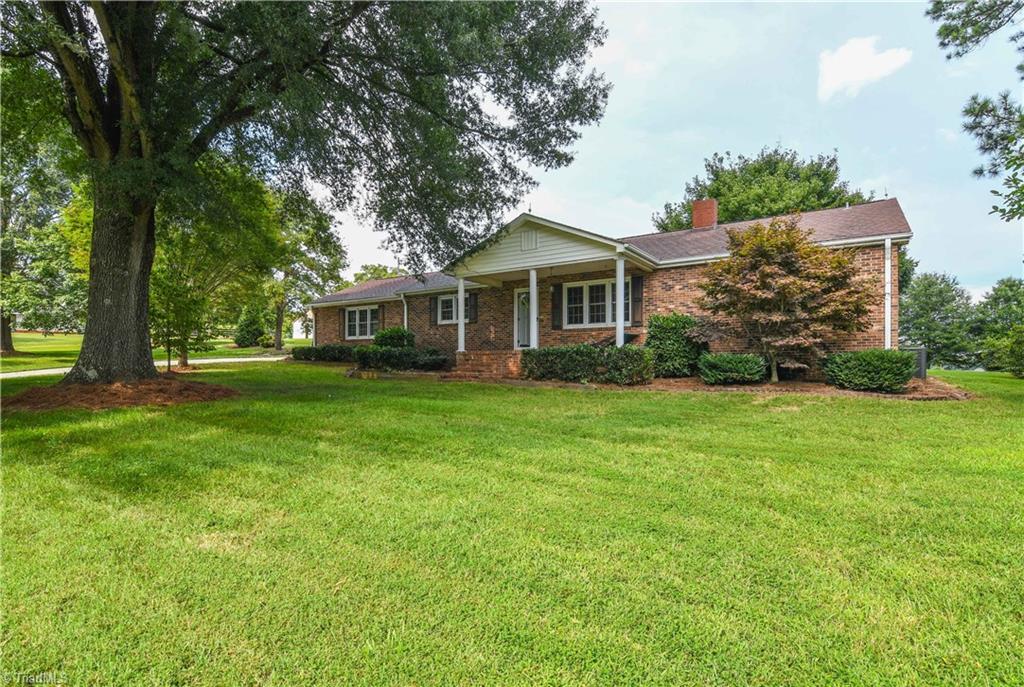 7836 Alcorn Road Oak Ridge, NC 27310 - Photo 1 of 28 Welcome to 7836 Alcorn Rd - a spacious brick ranch