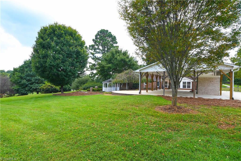 7836 Alcorn Road Oak Ridge, NC 27310 - Photo 23 of 28 Back of Home