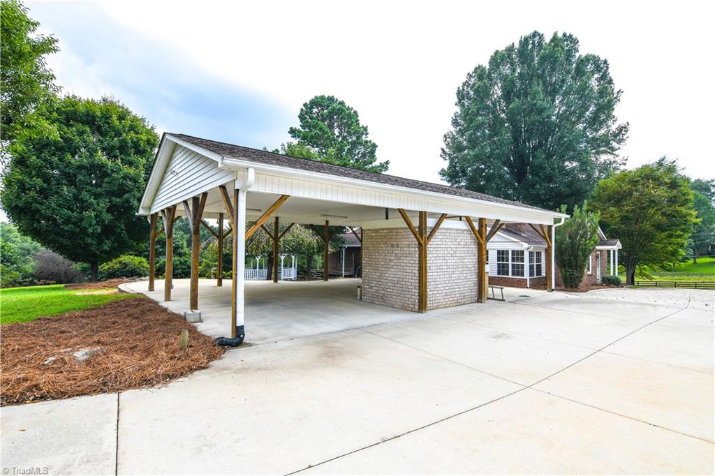 7836 Alcorn Road Oak Ridge, NC 27310 - Photo 25 of 28 Another View of the Carport