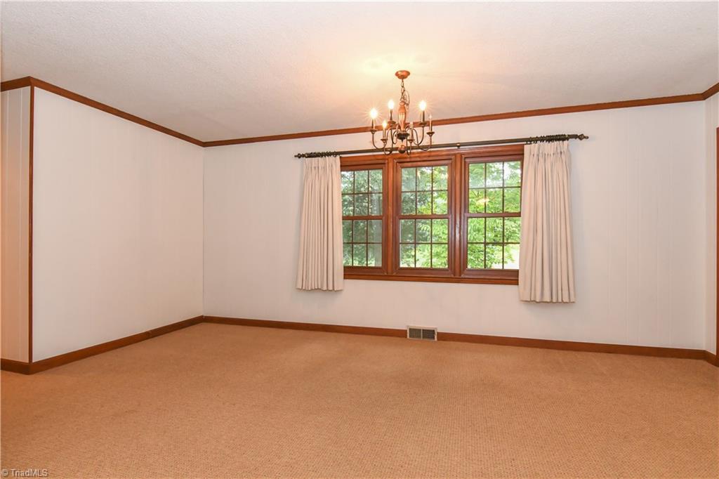 7836 Alcorn Road Oak Ridge, NC 27310 - Photo 9 of 28 This space could be used easily for a dining area for those large gatherings.