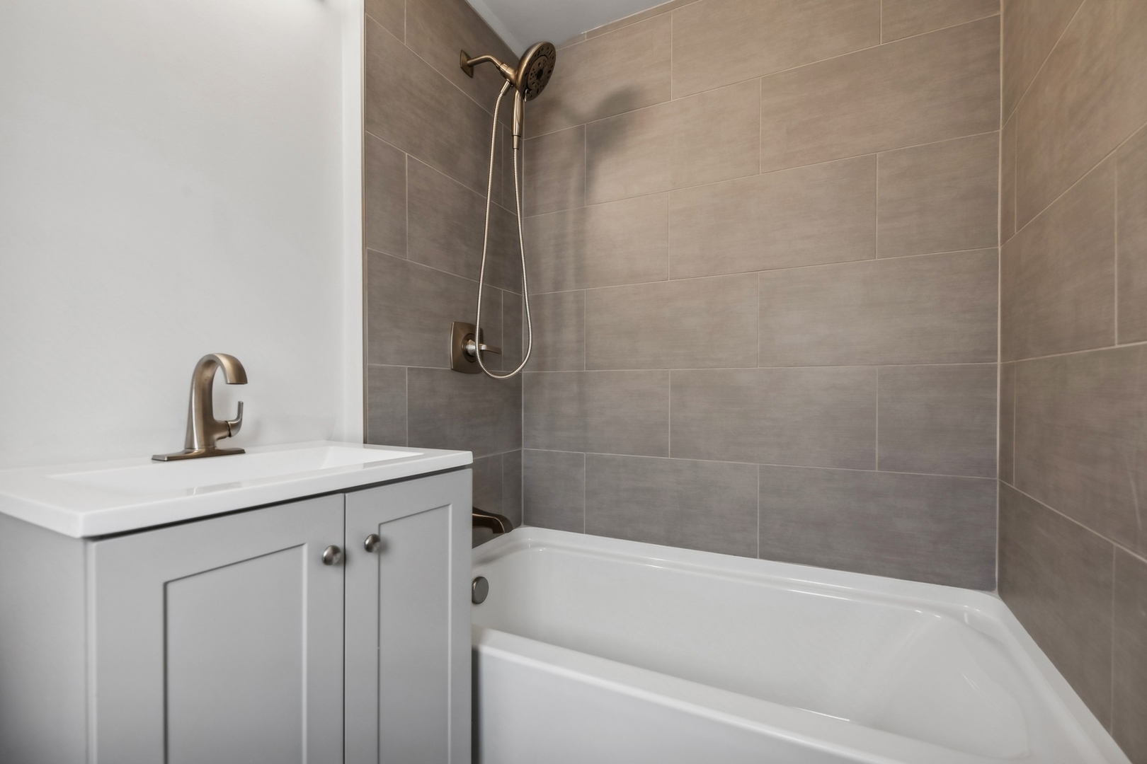 3529 South 54th Avenue Cicero, IL 60804 - Photo 12 of 19 a bath room with a sink toilet and shower