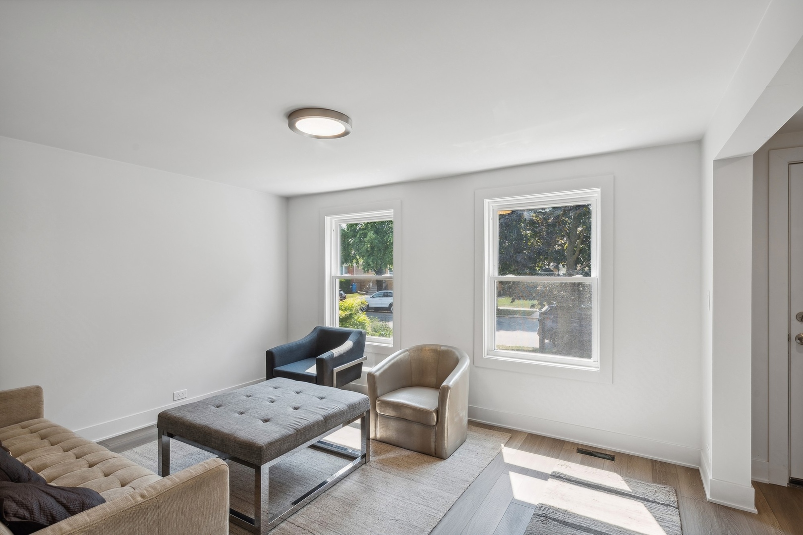 3529 South 54th Avenue Cicero, IL 60804 - Photo 3 of 19 a living room with furniture and a window