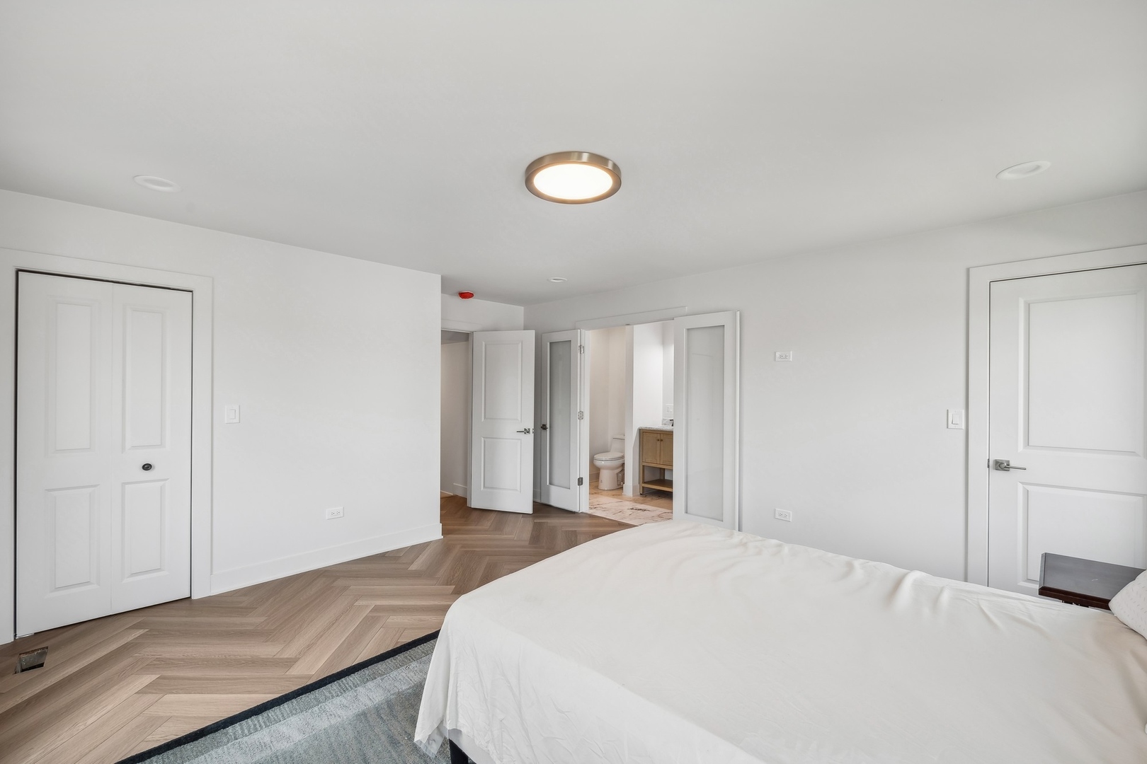 3529 South 54th Avenue Cicero, IL 60804 - Photo 8 of 19 a large white bed in a white room