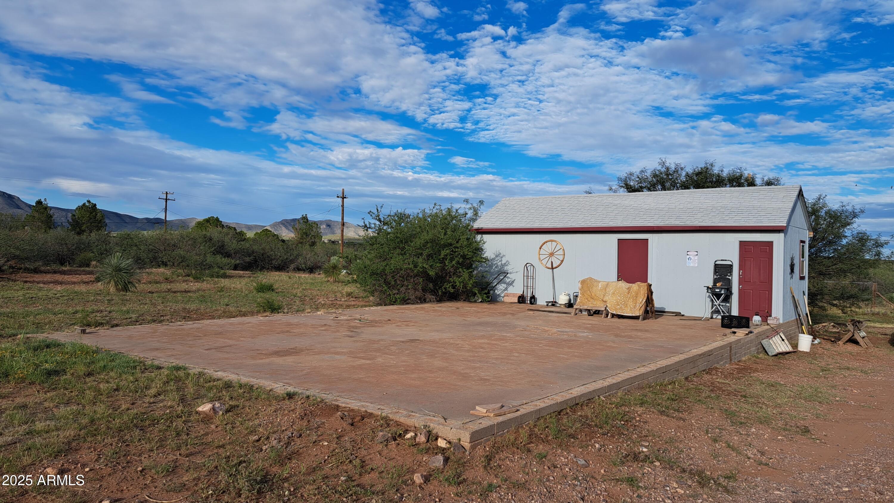 653 East Border Road Bisbee, AZ 85603 - Photo 19 of 29 a view of a house with a yard