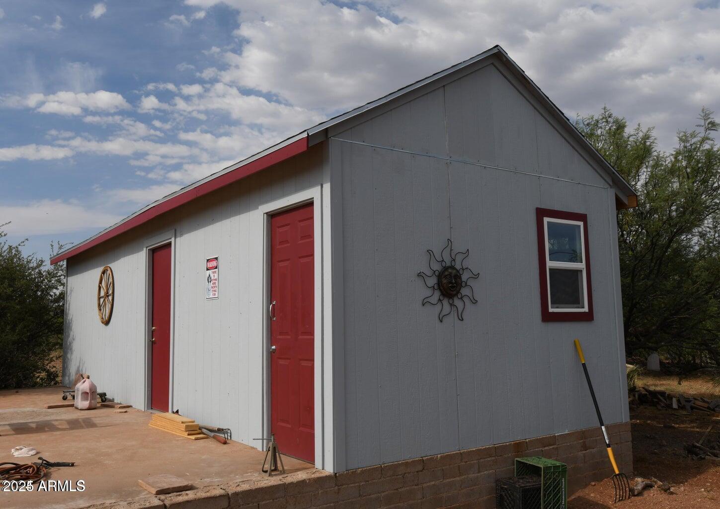 653 East Border Road Bisbee, AZ 85603 - Photo 21 of 29 a backyard of a house with seating space