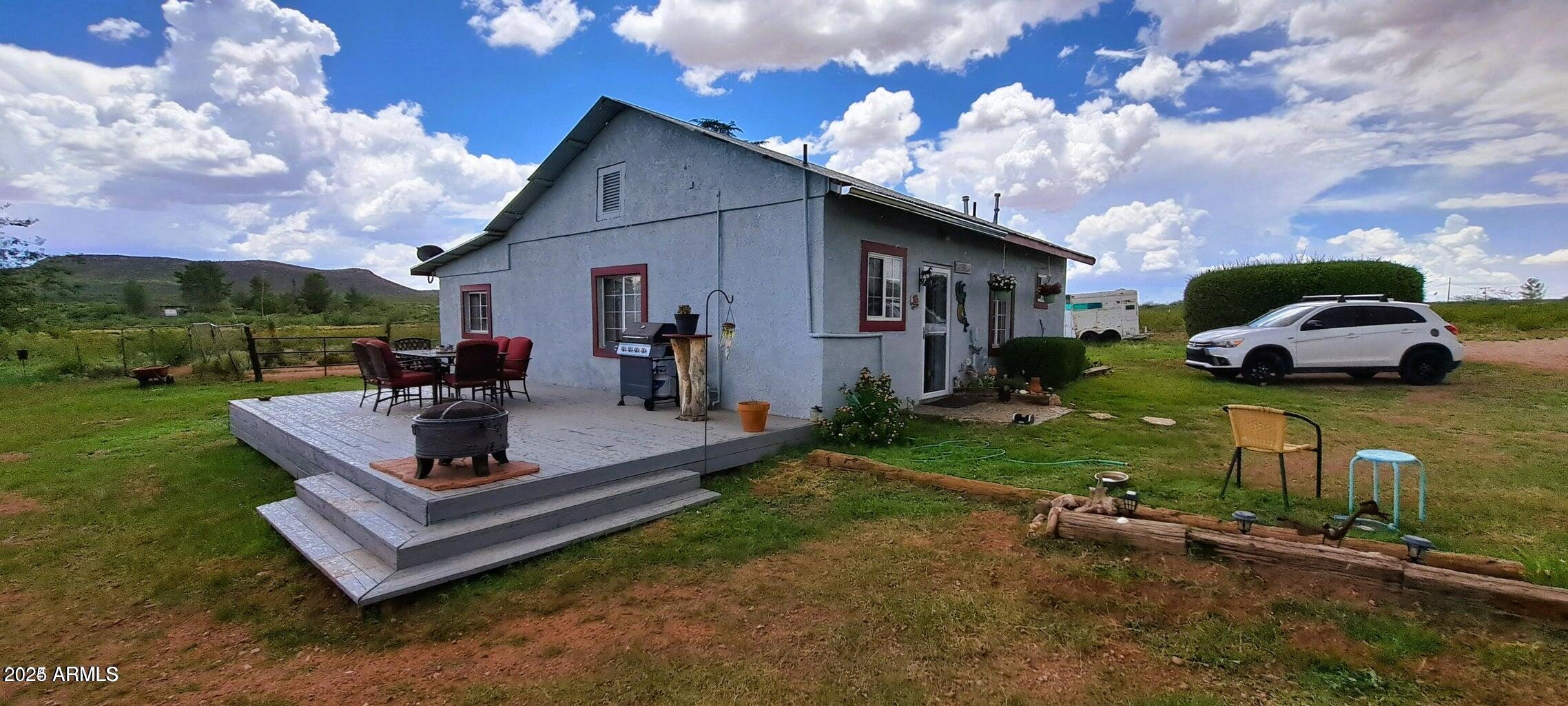 653 East Border Road Bisbee, AZ 85603 - Photo 9 of 29 a view of a house with backyard