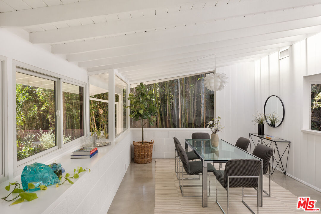 810 Bramble Way Los Angeles, CA 90049 - Photo 8 of 19 a living room with furniture and a large window