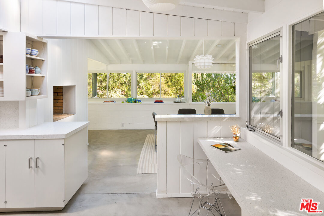 810 Bramble Way Los Angeles, CA 90049 - Photo 9 of 19 a view of kitchen with furniture and window