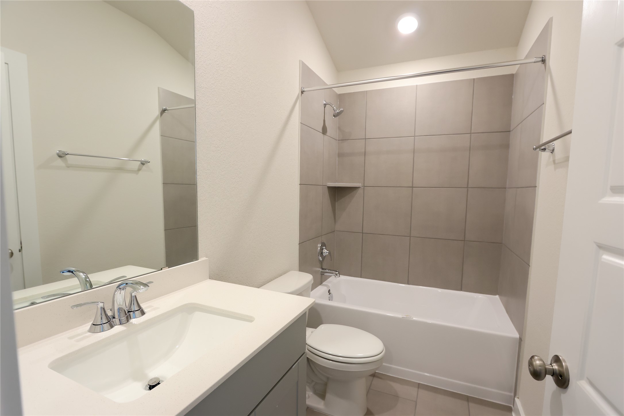 1435 Waggoner Rnch Trail Conroe, TX 77301 - Photo 3 of 17 a bathroom with a sink mirror toilet and bathtub