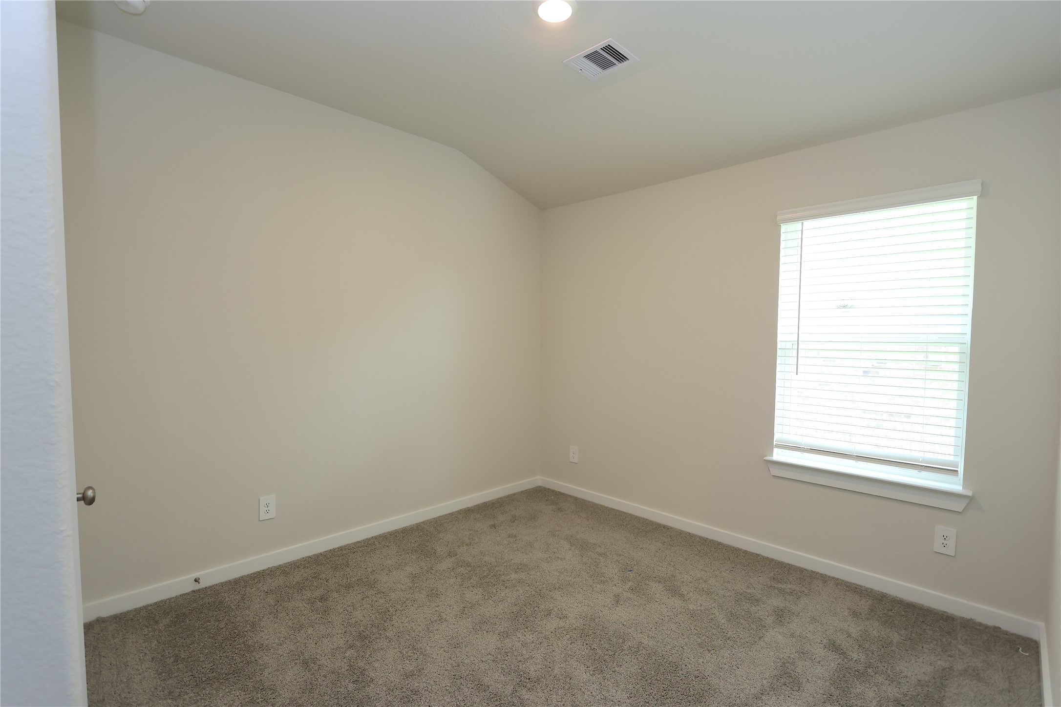 1435 Waggoner Rnch Trail Conroe, TX 77301 - Photo 4 of 17 an empty room with a window