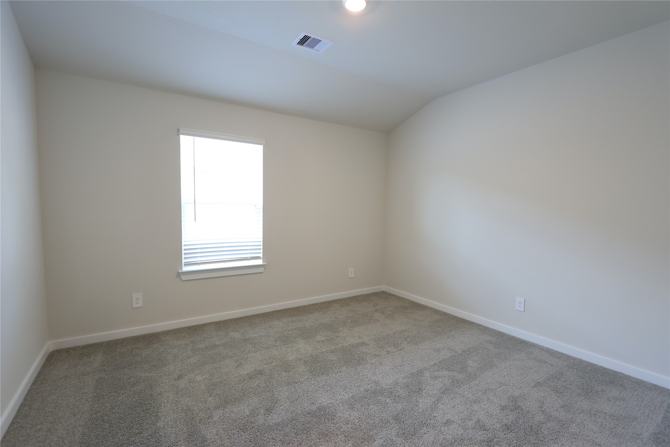 1435 Waggoner Rnch Trail Conroe, TX 77301 - Photo 6 of 17 an empty room with a window