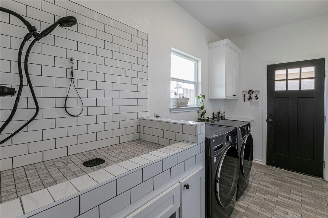 1973 Jackson Lane China Spring, TX 76633 - Photo 24 of 34 a bathroom with a sink a toilet and a mirror