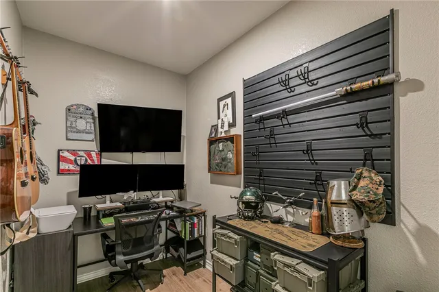 a white bath tub sitting next to a white sink