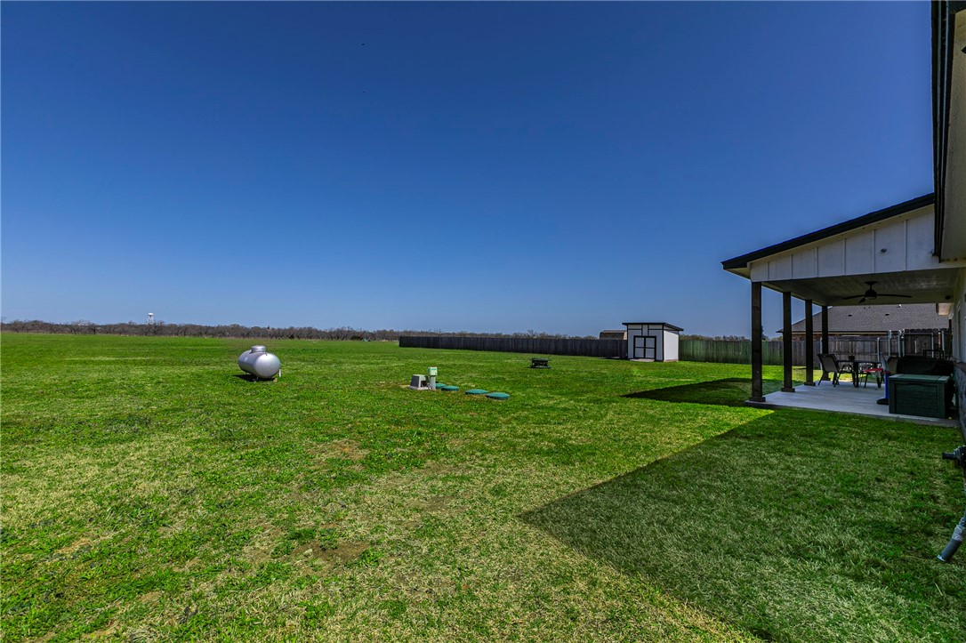 1973 Jackson Lane China Spring, TX 76633 - Photo 30 of 34 a view of yard with swimming pool and outdoor seating