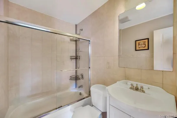 a bathroom with a sink and a shower