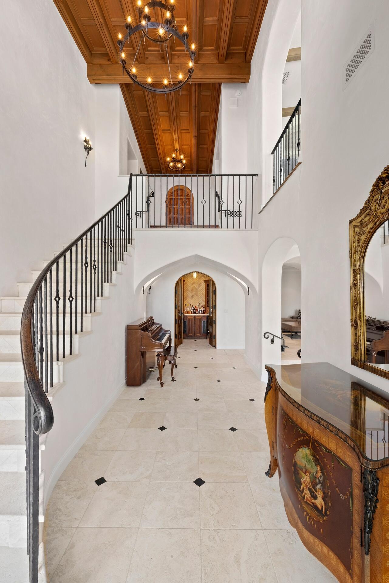 1117 Las Alturas Road Santa Barbara, CA 93103 - Photo 14 of 28 a view of staircase and kitchen with a sink