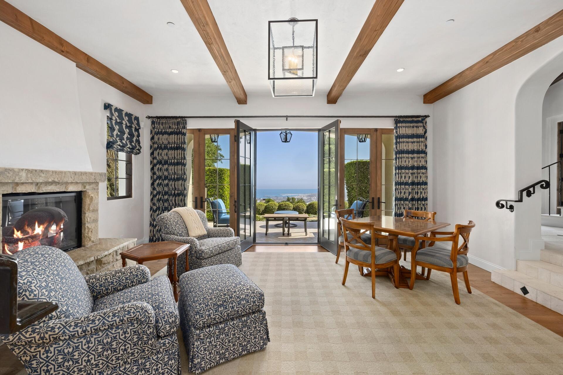 1117 Las Alturas Road Santa Barbara, CA 93103 - Photo 18 of 28 a living room with furniture and large windows
