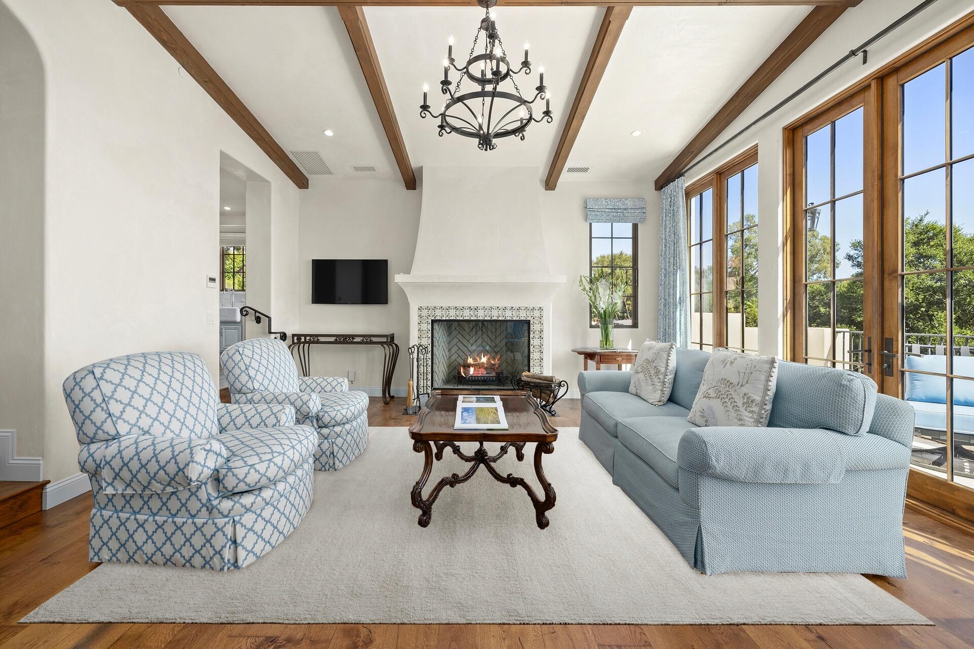 1117 Las Alturas Road Santa Barbara, CA 93103 - Photo 6 of 28 a living room with furniture and a fireplace