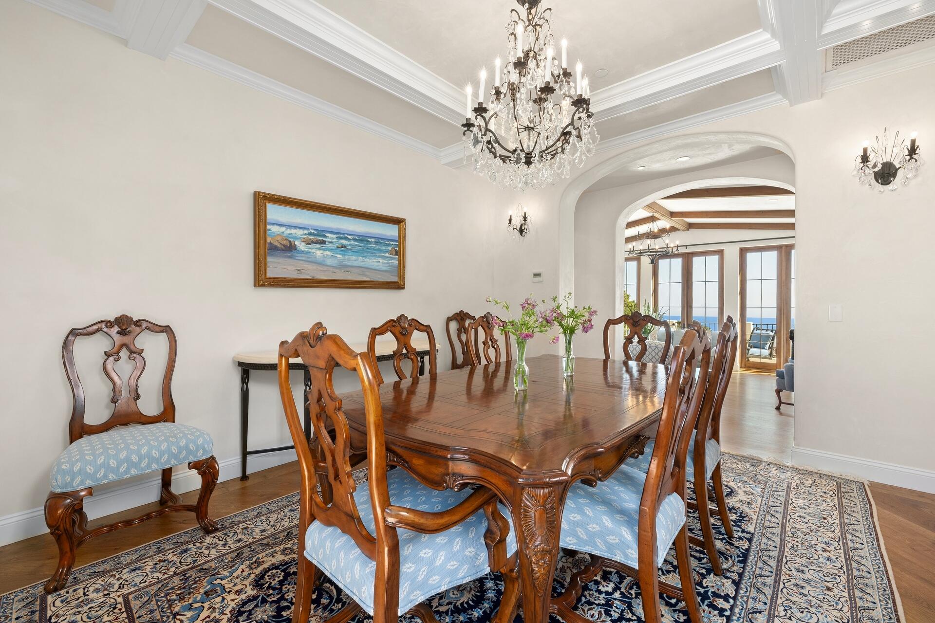 1117 Las Alturas Road Santa Barbara, CA 93103 - Photo 9 of 28 a view of a dining room with furniture a chandelier and wooden floor