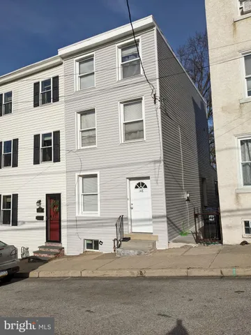 a view of a house with a street