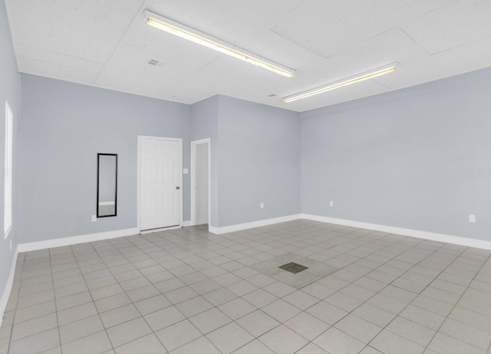 9678 Interstate 10 Frontage Road, Unit 1 Sealy, TX 77474 - Photo 9 of 19 an empty room with white walls