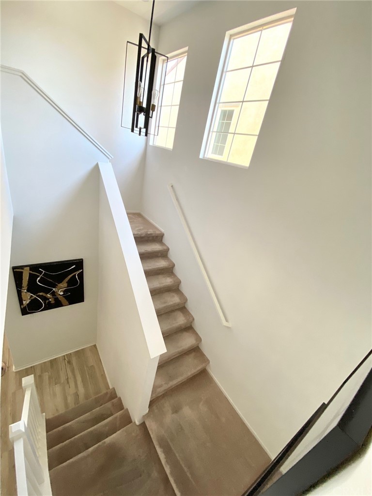 858 Blue Orchid Beaumont, CA 92223 - Photo 12 of 33 a view of entryway and hall with wooden floor