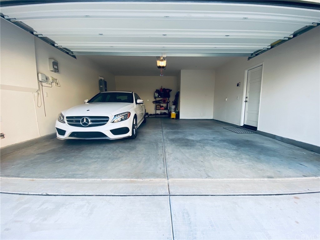 858 Blue Orchid Beaumont, CA 92223 - Photo 29 of 33 a car parked in the parking