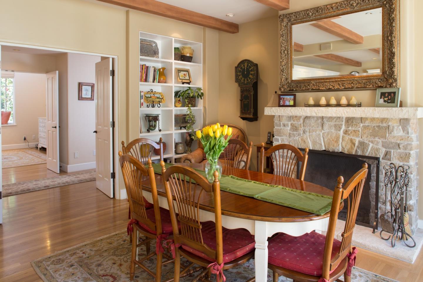 25951 Ridgewood Road Carmel, CA 93923 - Photo 11 of 23 a view of a dining room with furniture and wooden floor