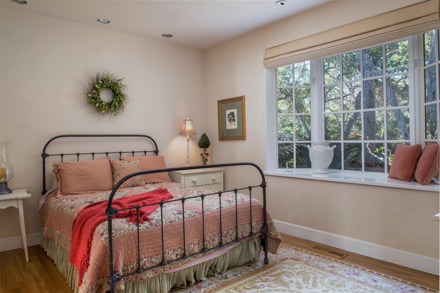 25951 Ridgewood Road Carmel, CA 93923 - Photo 14 of 23 a bedroom with a bed and a window