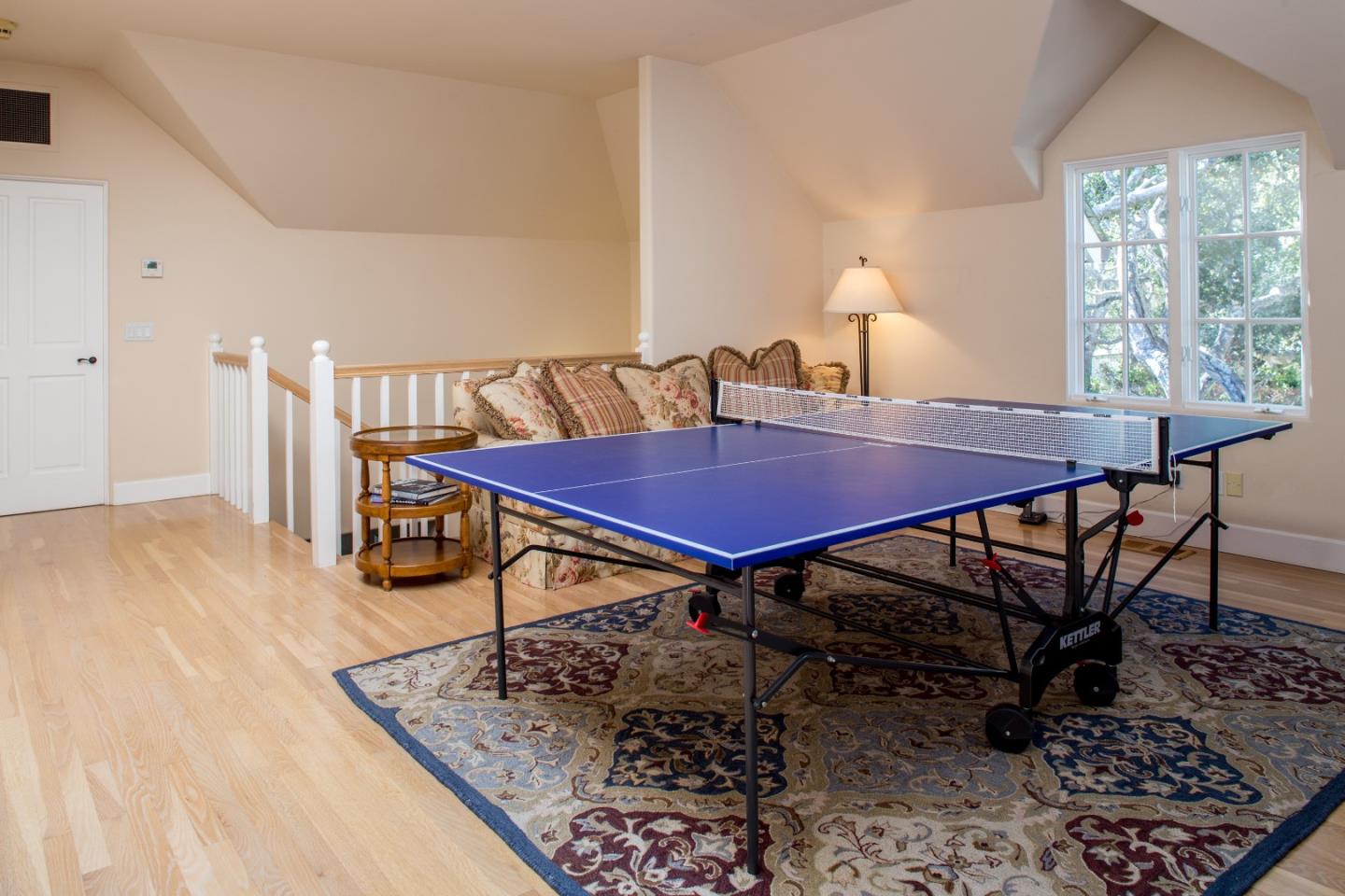 25951 Ridgewood Road Carmel, CA 93923 - Photo 18 of 23 a dining room with furniture and wooden floor
