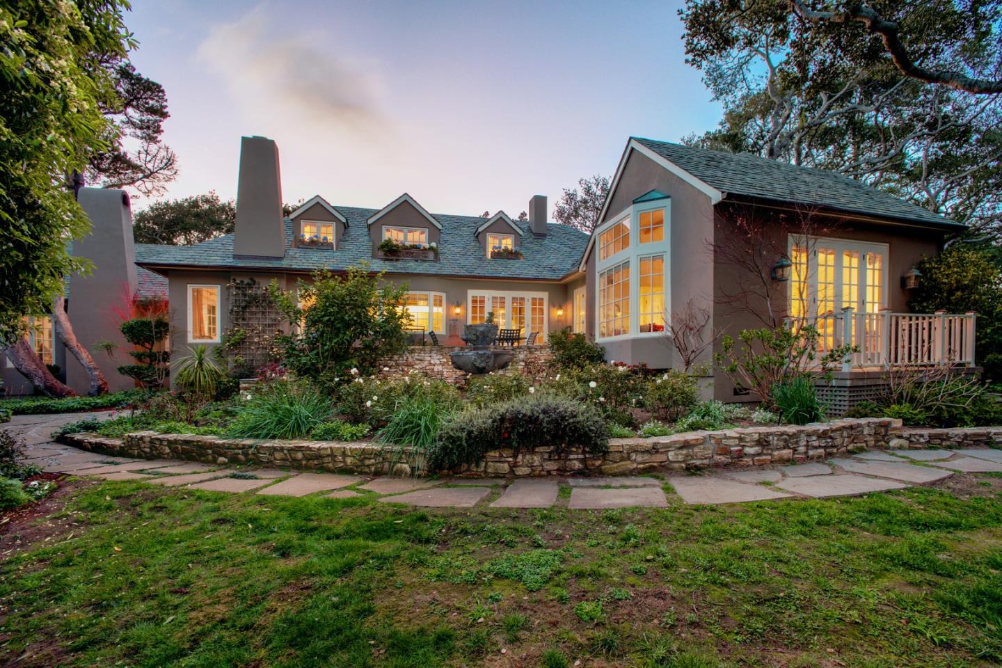 25951 Ridgewood Road Carmel, CA 93923 - Photo 22 of 23 a front view of a house with garden