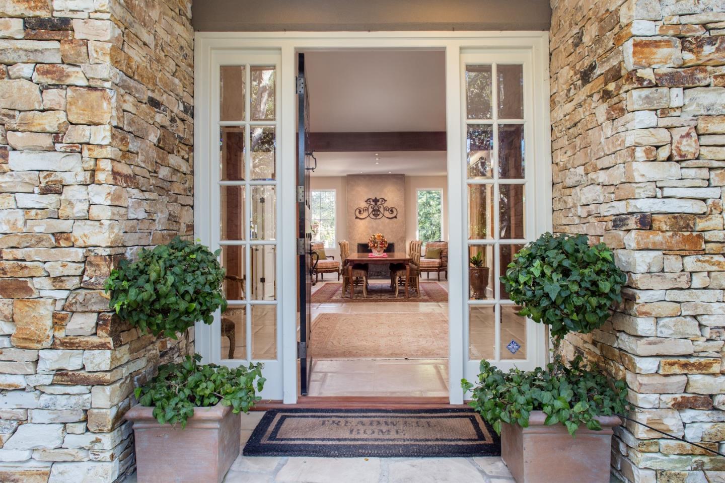 25951 Ridgewood Road Carmel, CA 93923 - Photo 3 of 23 a view of house with patio