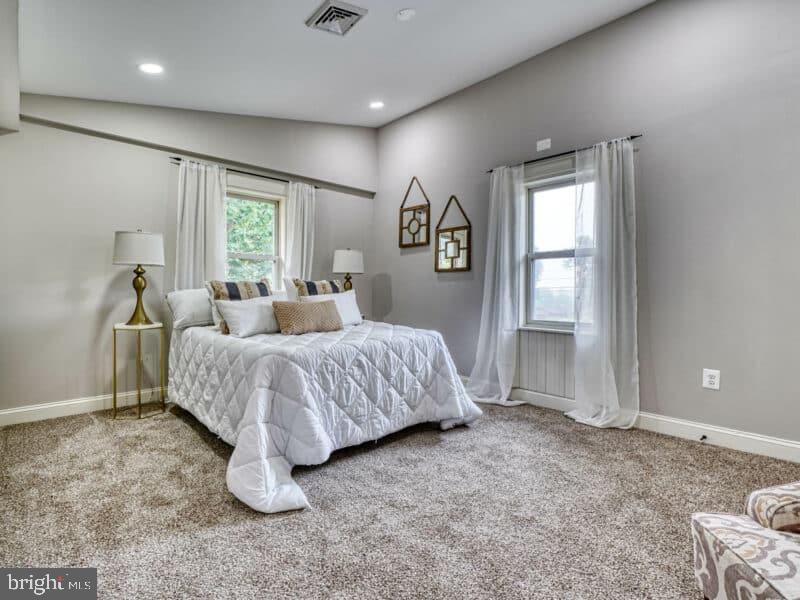 19701 Old York Road White Hall, MD 21161 - Photo 11 of 17 a spacious bedroom with a bed and a window