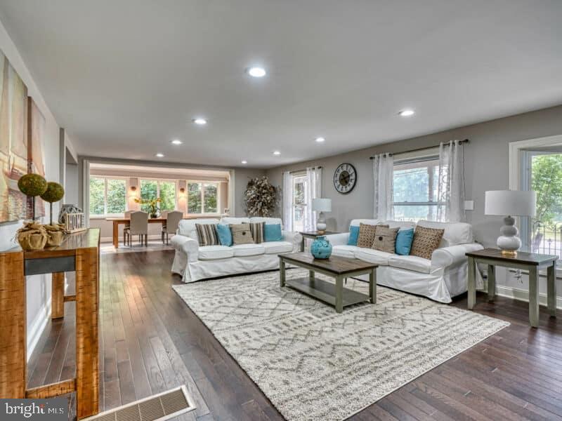 19701 Old York Road White Hall, MD 21161 - Photo 5 of 17 a living room with fireplace furniture and a wooden floor