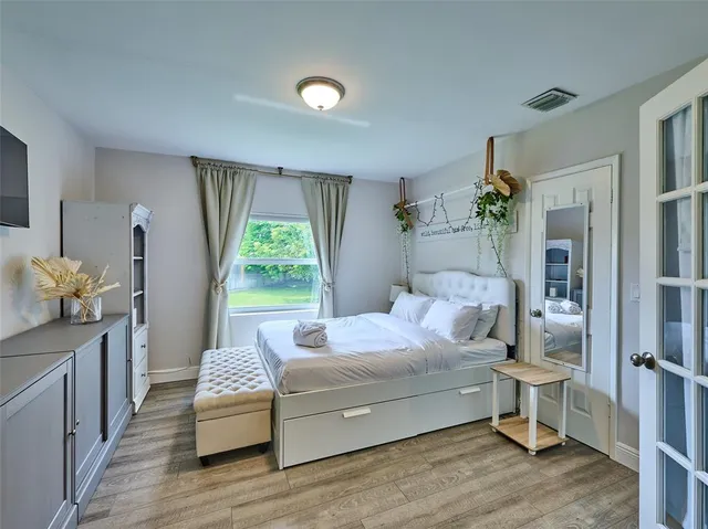 a living room with furniture and window