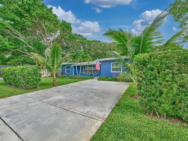 a view of a backyard with a garden