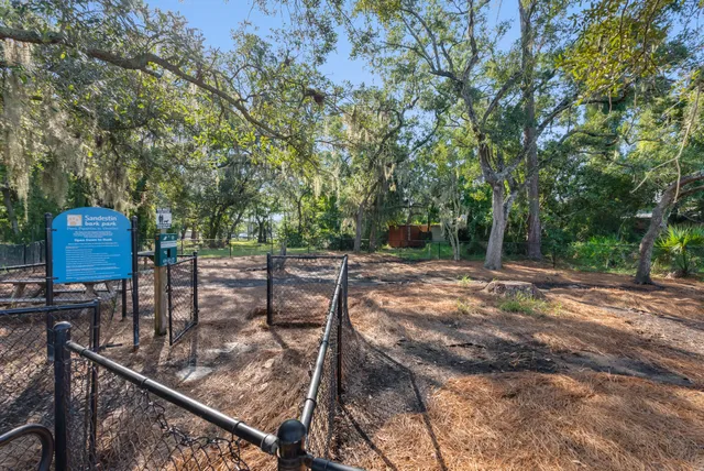 a view of a backyard with sitting area