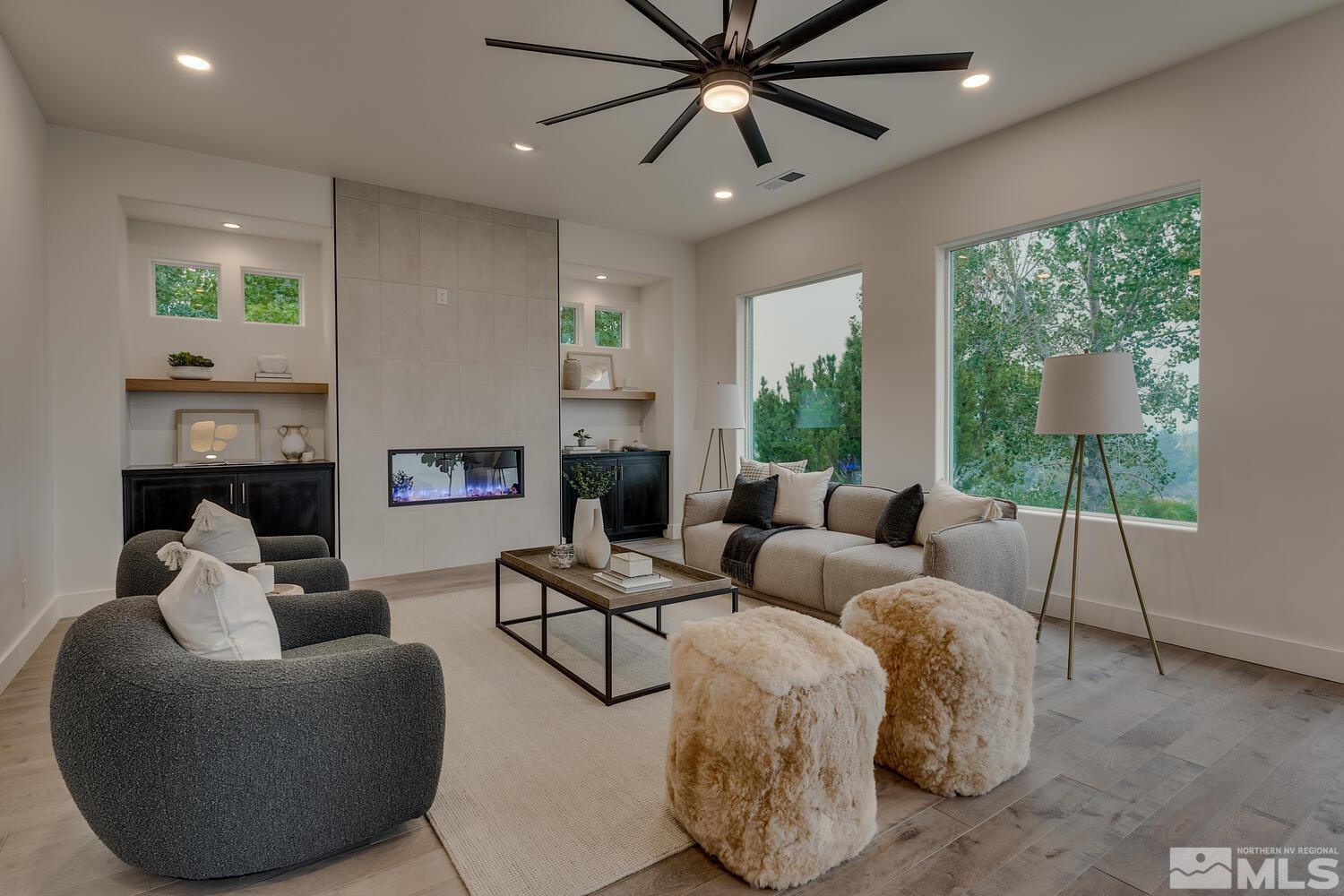 6109 Mesa Road Reno, NV 89511 - Photo 12 of 40 a living room with furniture and a fireplace