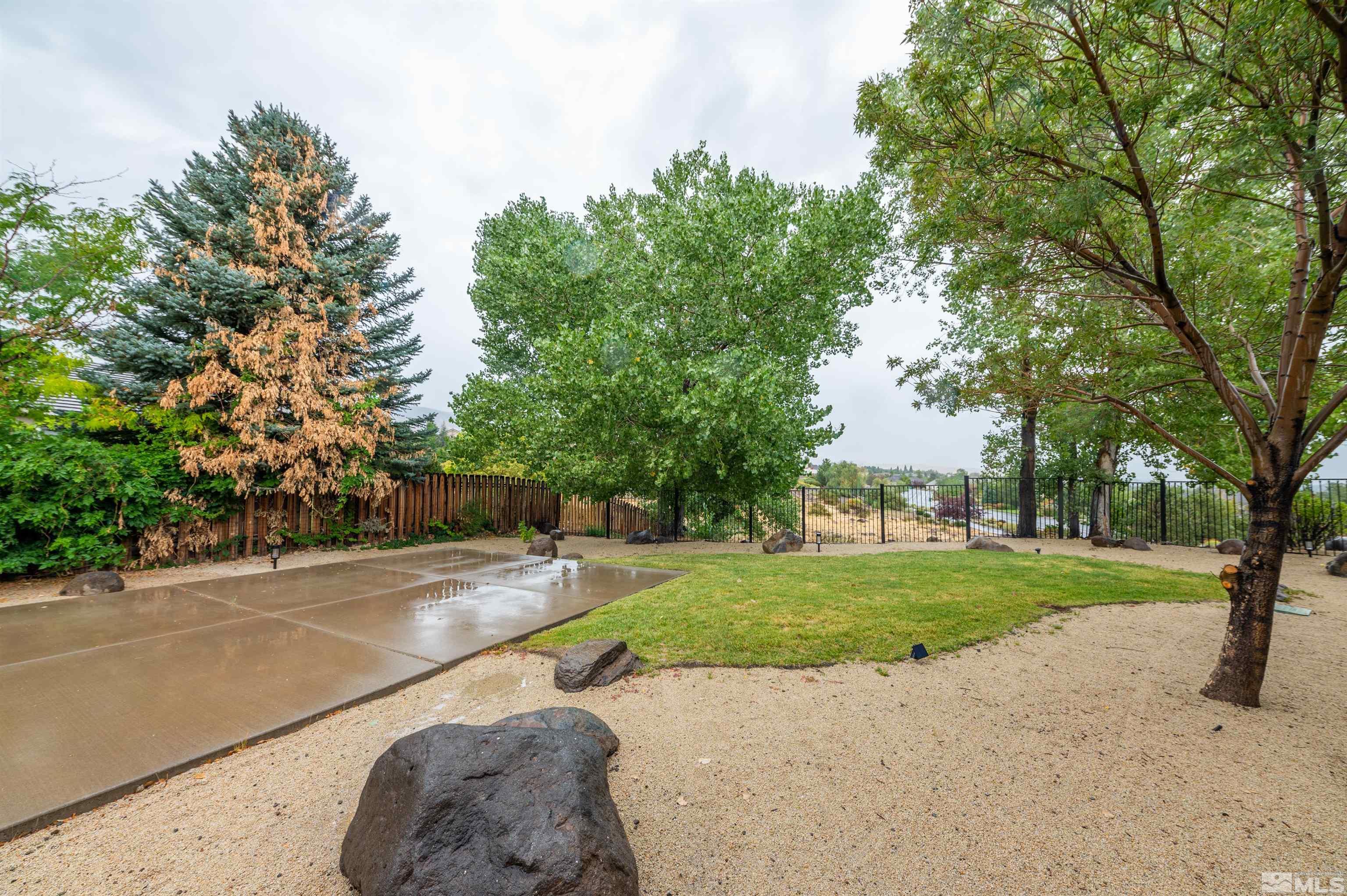 6109 Mesa Road Reno, NV 89511 - Photo 30 of 40 a view of a street with a house and trees