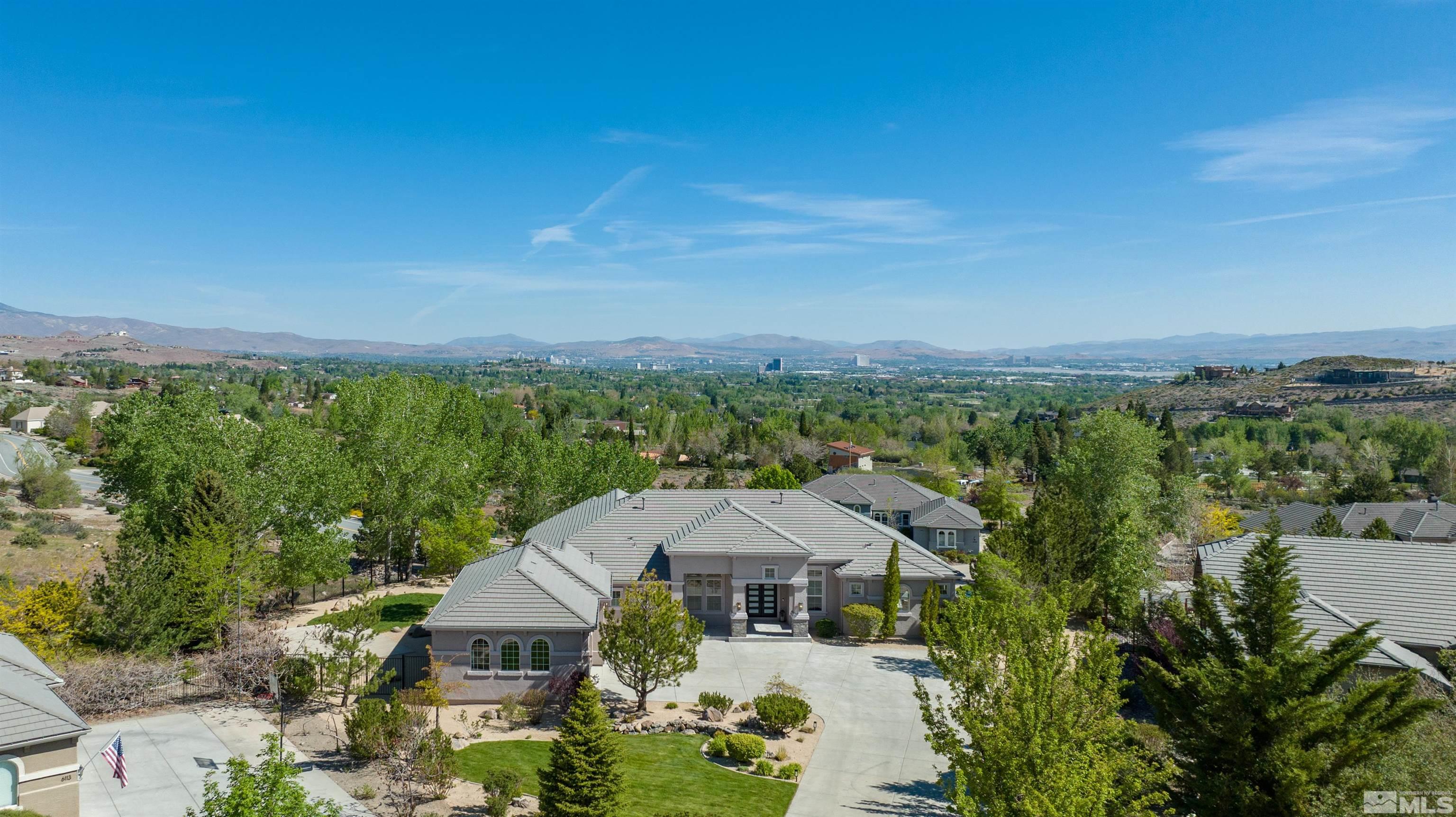 6109 Mesa Road Reno, NV 89511 - Photo 35 of 40 an aerial view of a house with a yard and lake view